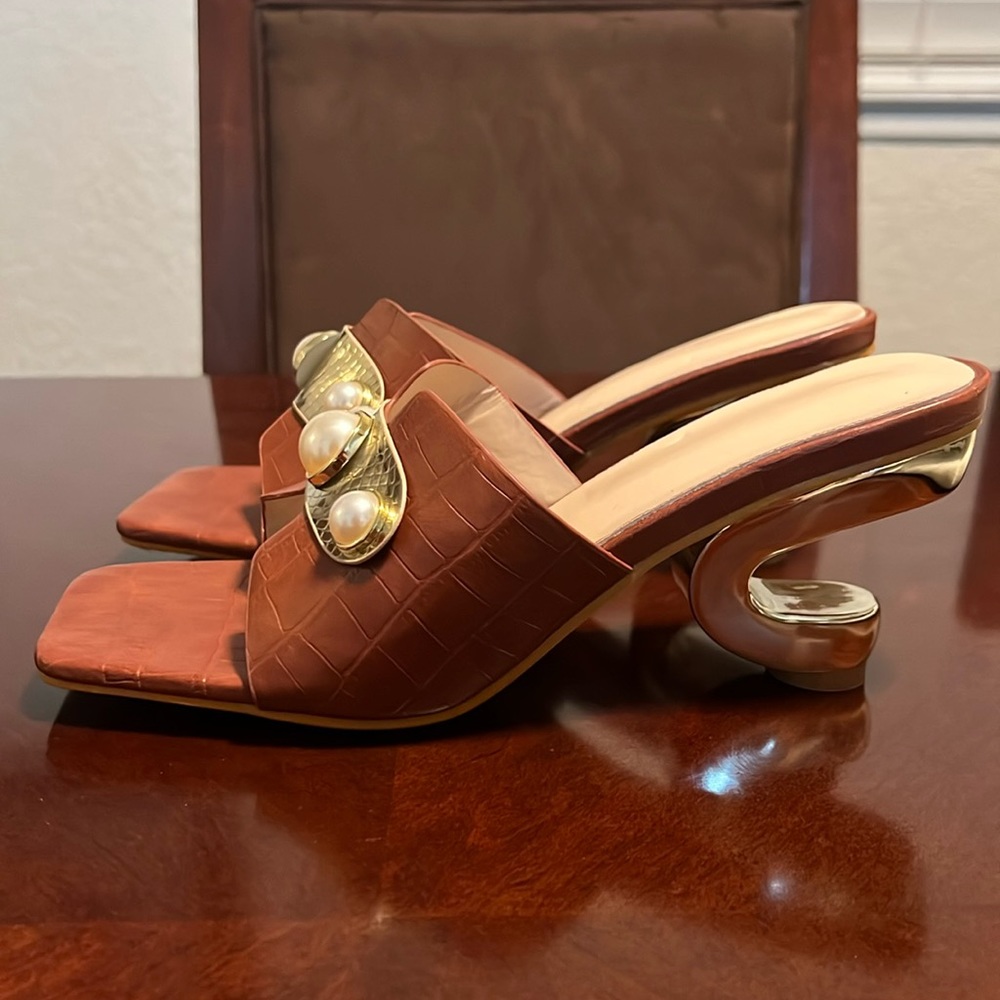 Odd Heel Shape Slip-Ons